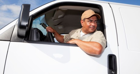 Latino business owner drives a van | How to get a small business insurance quote
