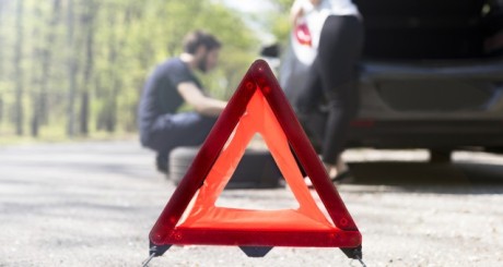 car pulled over with trunk open