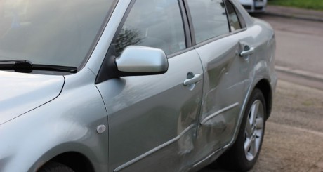 car with damage on the door