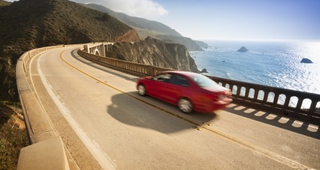 car speeding down highway